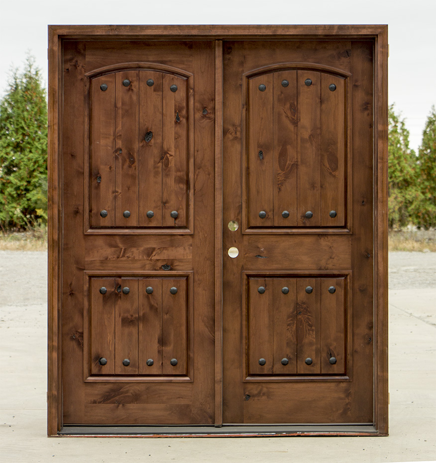 rustic double doors in knotty lader wood
