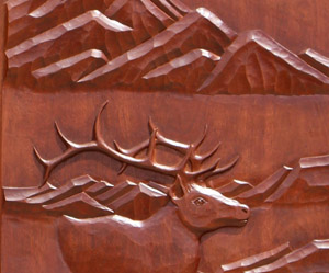 Carved ELK doors closeup